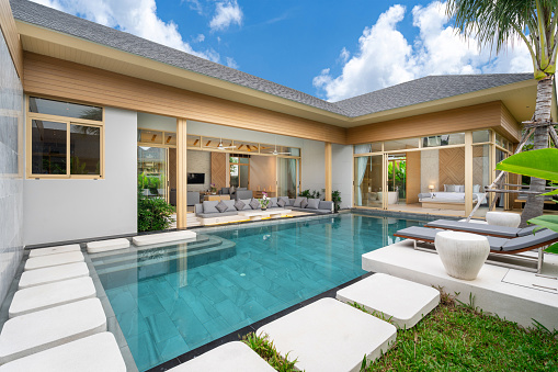 home or house Exterior design showing tropical pool villa with greenery garden